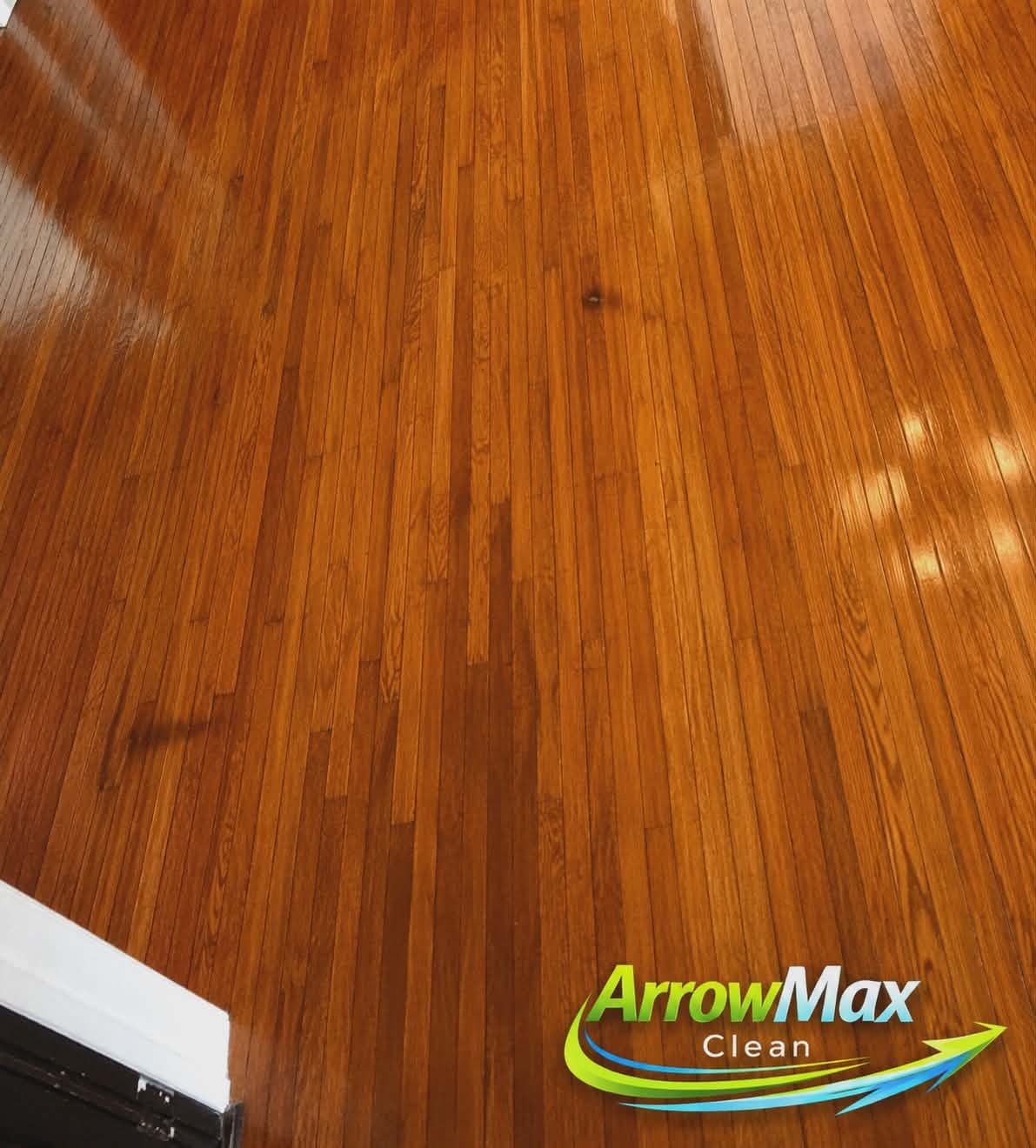 Hardwood floor after ArrowMax Clean cleaning service.